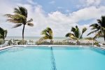 Relax in the Resort Pool Located Beachfront with Ocean Views  Florida Keys Vacation Rental